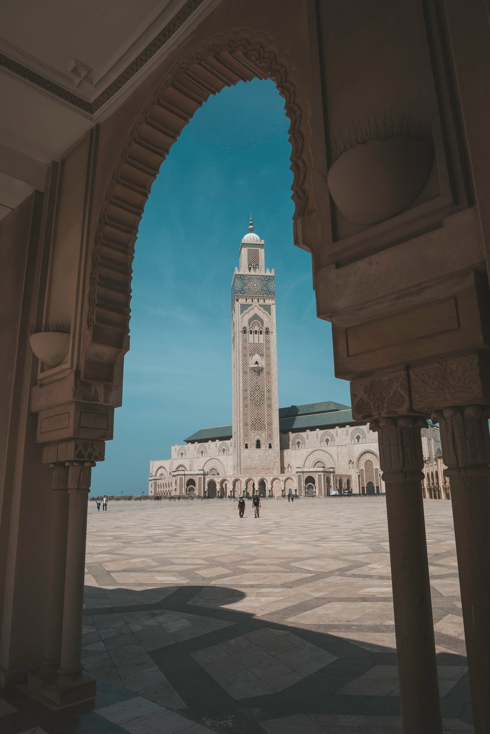 Looking through a horseshoe arch to the Hassan II minaret