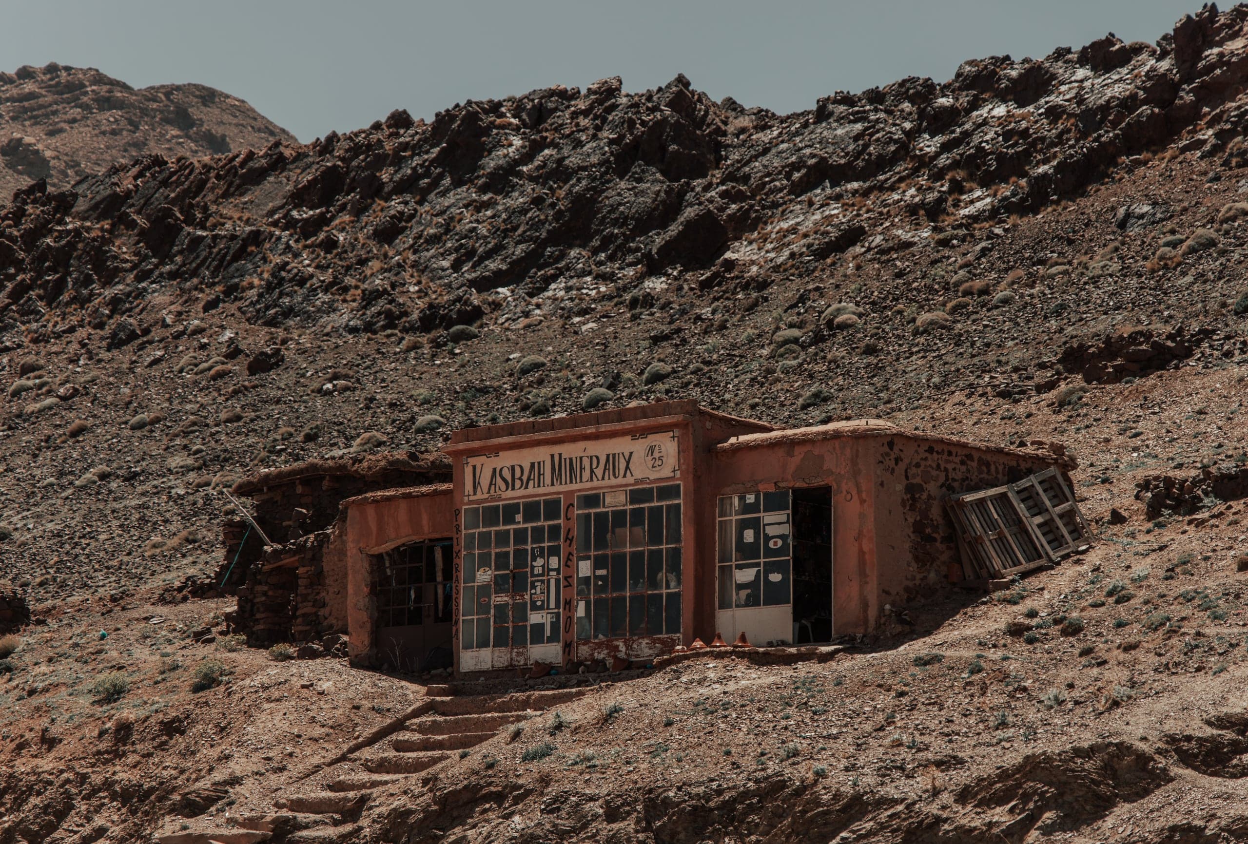 A small roadside shop dug into a rocky slope on the Tichka road